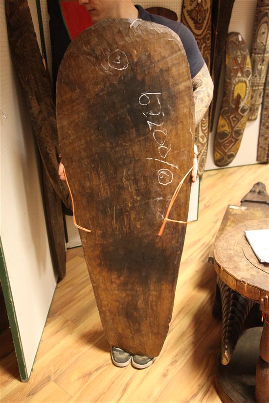 A Sepik River wooden ancestor spirit board and two other boards